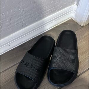 Bebe Black Slides